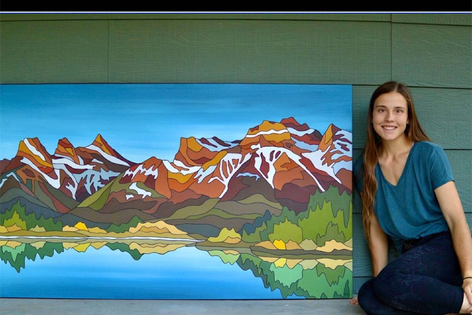 Local artist Elizabeth Houghton seen here with one of her landscape paintings has been chosen to be part of the Penticton Square Mural Project. (Elizabeth Houghton Instagram)