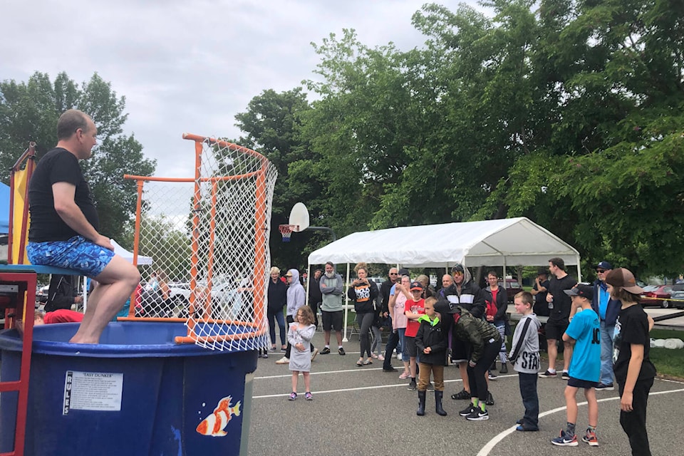 Discovery House executive director Jerome Abraham raised a record $18K through dunk tank pledges. (Monique Tamminga Western News)