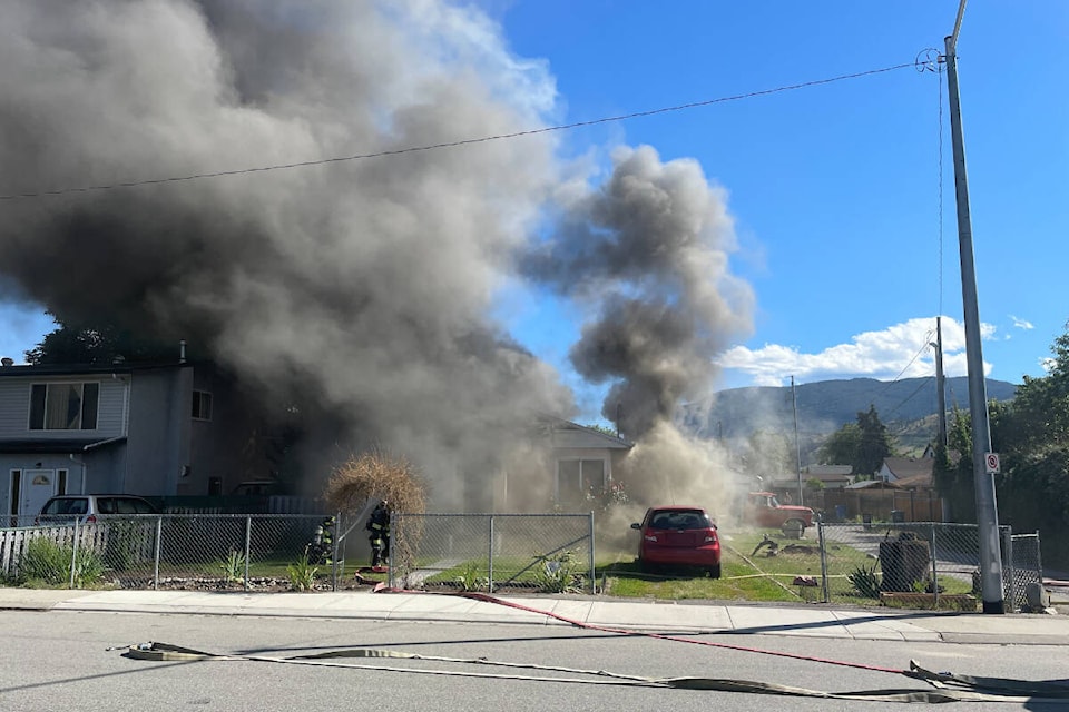 A Wednesday afternoon fire breaks out on Penticton’s Conklin Avenue. (Brennan Phillips- Western News)