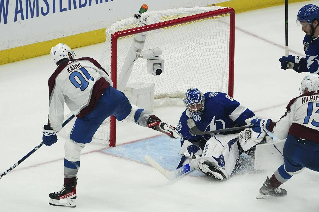 Tampa Bay Lightning goaltender Andrei Vasilevskiy (88) makes a blocker save  against the Toronto Maple Leafs during first period, first round, game  seven NHL Stanley Cup playoff hockey action in Toronto on