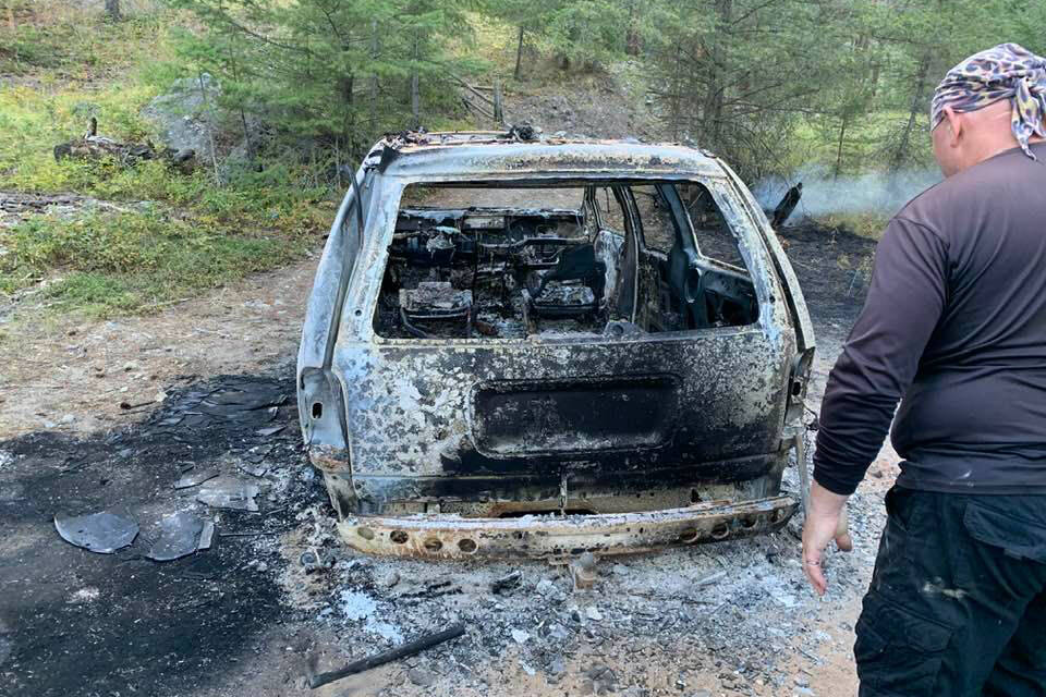 This mini-van was dumped and torched Sunday morning causing the fire to spread and get out of control in Naramata. Luckily, locals were on the scene. (Facebook)
