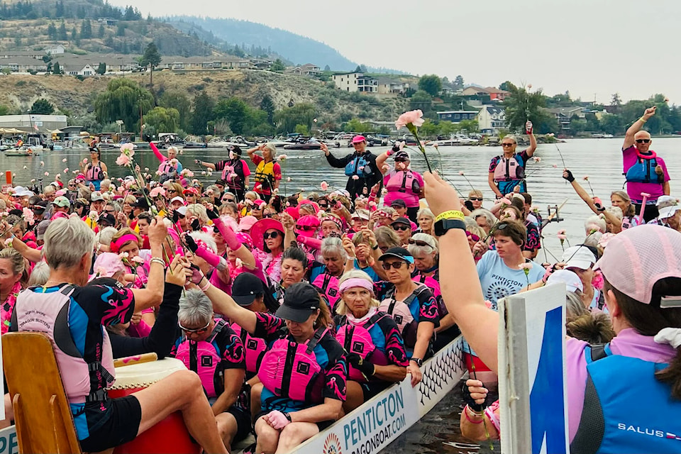 It was a moving pink carnation ceremony honouring survivors and those who have died from breast cancer at the Penticton Dragon Boat Festival on Sunday. (Monique Tamminga Western News)