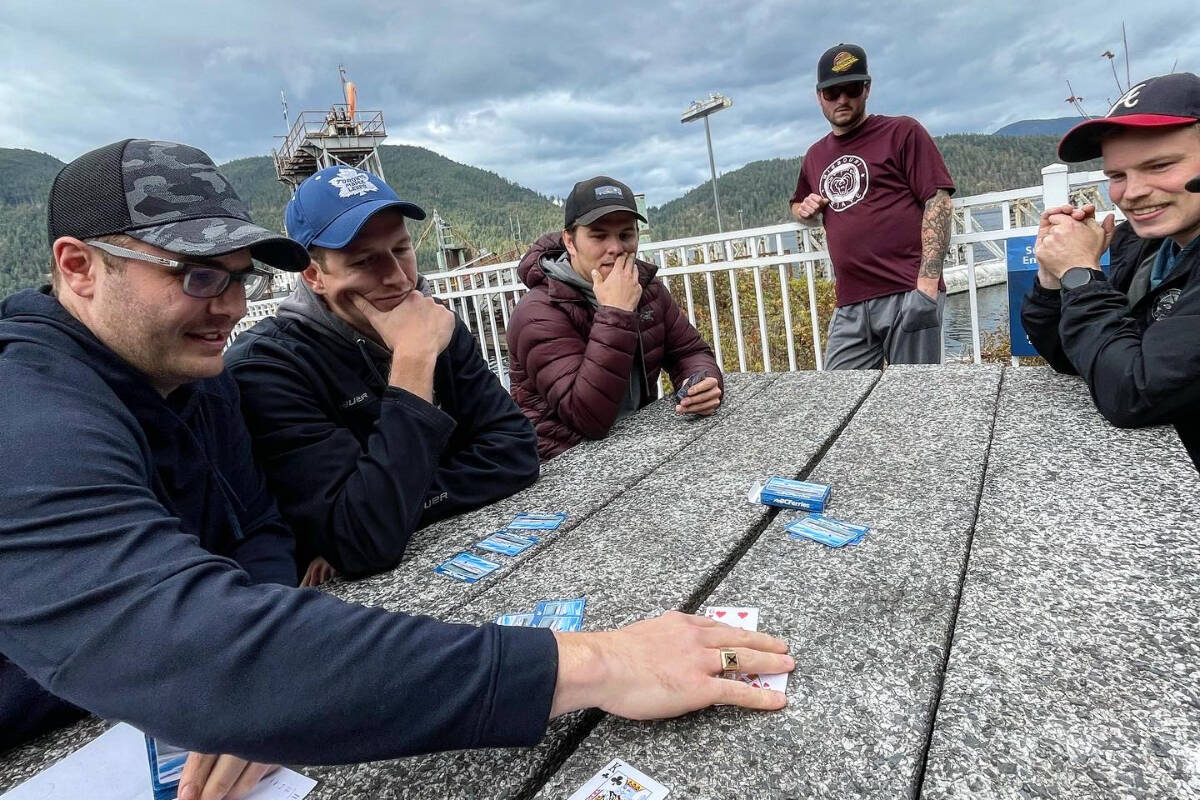 Members of the Penticton Silver Bullets bonding before their games against the Powell River Regals last weekend. (Contributed)