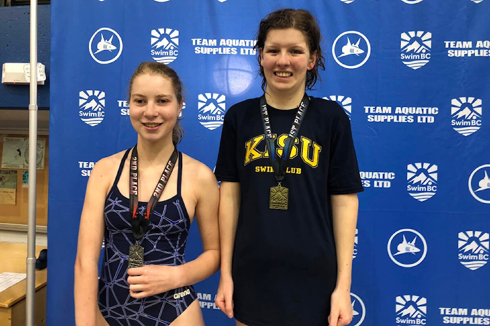 Okanagan Para Swimming members Senna Entner of Vernon (left) and Brea Duncan of Armstrong won silver and gold, respectively, in the S7 100-metre backstroke at the B.C. Winter Provincial Swimming Championships in Victoria. (Facebook photo)
