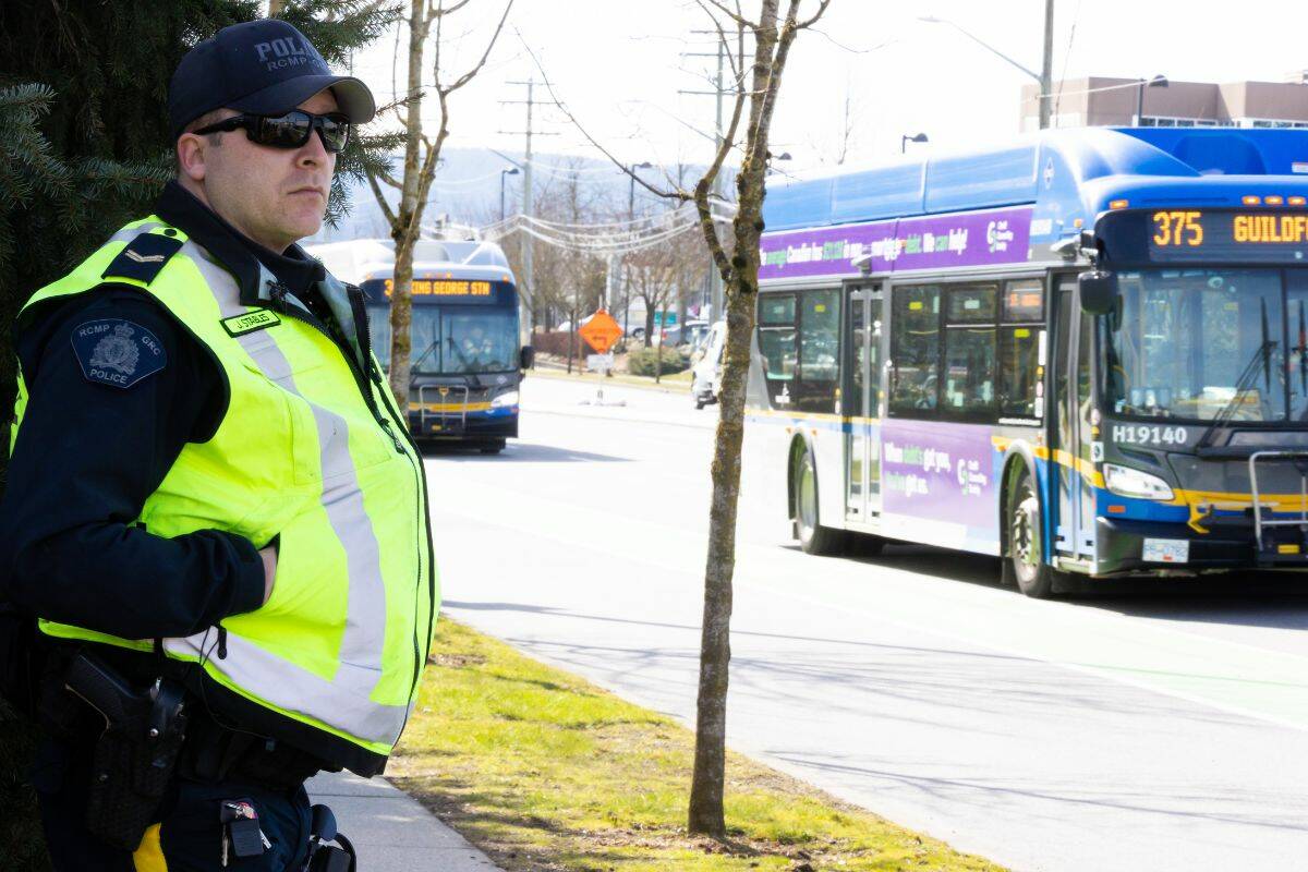 Cpl. John Stables is looking out for distracted drivers during Operation Hang Up at 152 Street and Highway 10 on March 9, 2023. (Photo: Anna Burns)