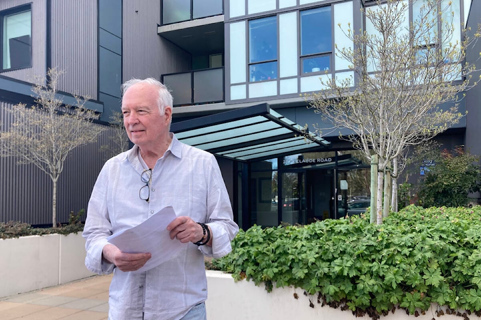 Dennis MacDonald stands outside RidgeView at 2770 Claude Rd. with a letter from Centurion. (Bailey Moreton/News Staff)