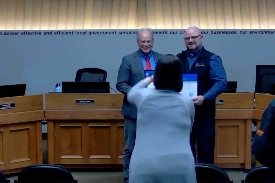 Mayor Victor Cumming presents Gary Lefebvre with the Vernon Aquatic Centre’s affiliate awards during Monday, April 24 council meeting. (Video still).