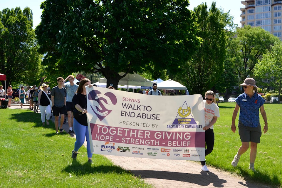 More than 75 people Walk to End Abuse from Penticton’s Rotary Park to the S.S. Sicamous and back on Sunday, June 4. (Monique Tamminga Western News)