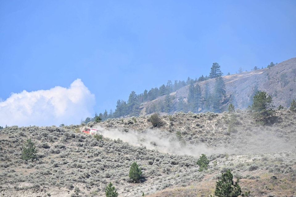 A grass fire off Skaha Hills Road in Penticton on Friday, July 14. (Brennan Phillips- Western News)