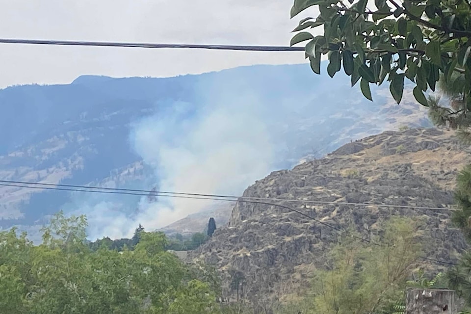 Smoke visible from throughout Oliver on Monday. (Caroline White Facebook)