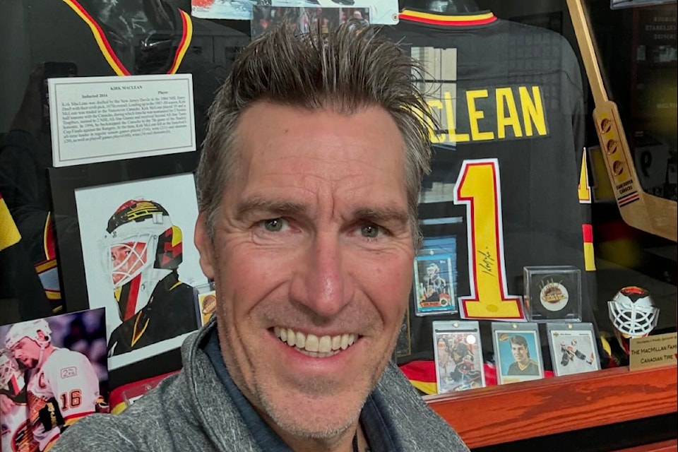 Former Vancouver Canucks goaltender Kirk McClean in front of his BC Hockey Hall of Fame display in Penticton in September 2024.