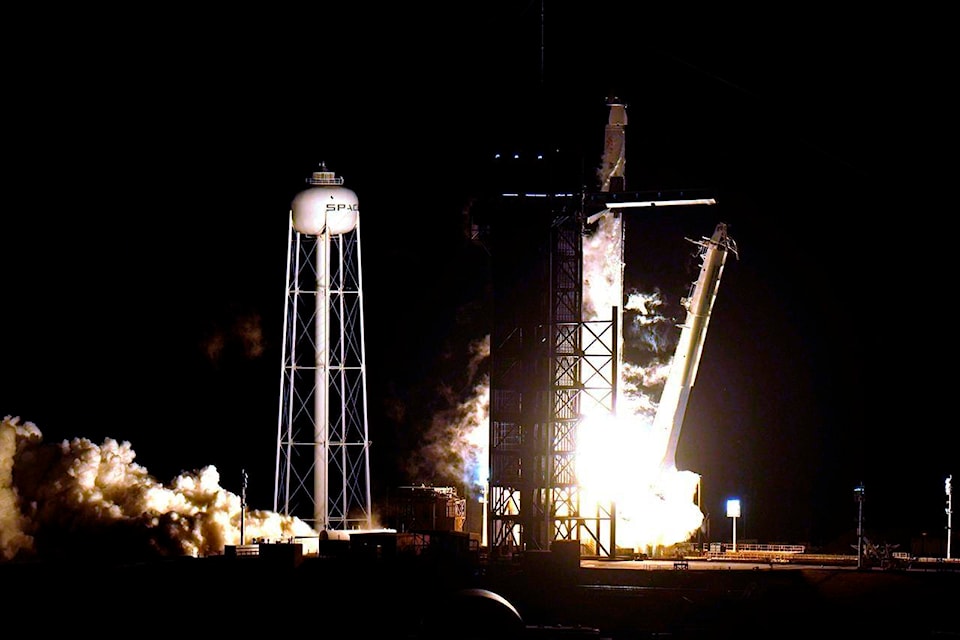 A SpaceX Falcon9 rocket, with the Crew Dragon capsule attached, lift’s off from Kennedy Space Center’s Launch Complex 39-A Sunday Nov. 15, 2020, in Cape Canaveral, Fla. Four astronauts are beginning a mission to the international Space Station. (AP Photo/Chris O’Meara)