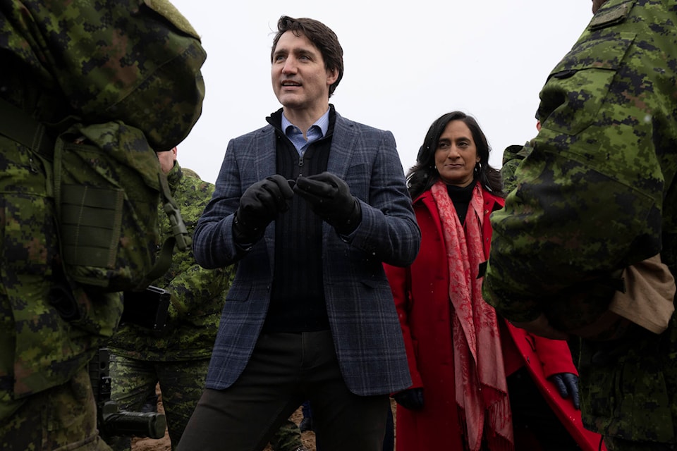 28800266_web1_220414-CPW-Canadian-troops-Poland-Trudeau_1