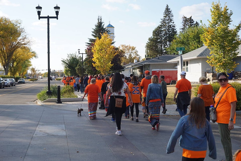 Wetaskiwin community members participate in a walk for National Truth and Reconciliation/ Orange Shirt Day. (Shaela Dansereau/ Pipestone Flyer)