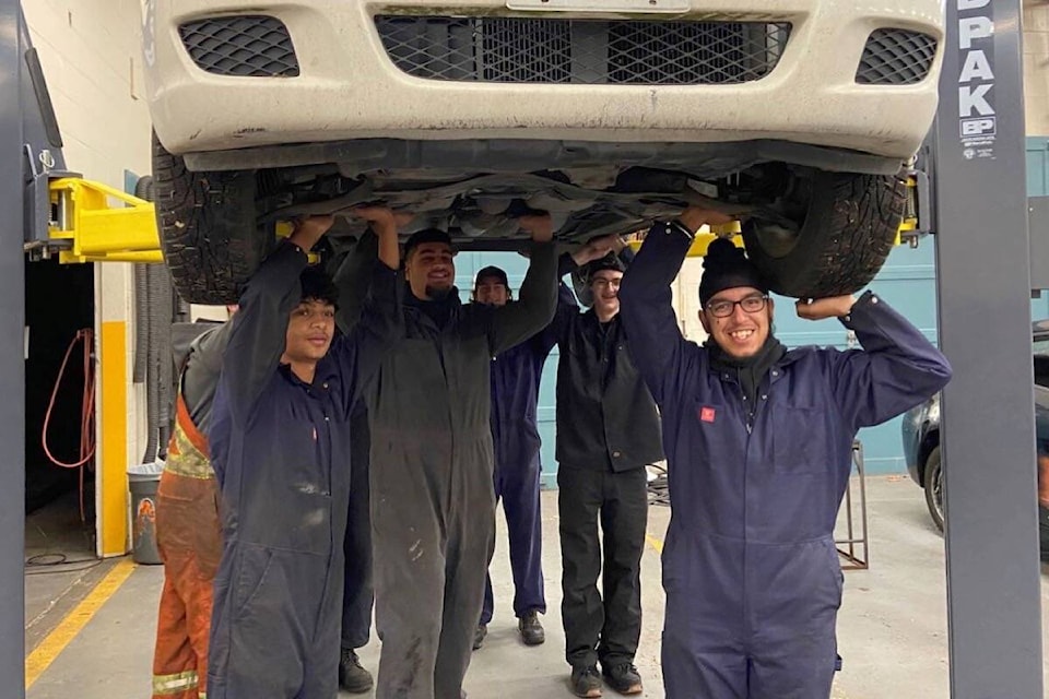 33849677_web1_221129-NDR-M-Delta-Auto-Service-Technician-Program-Students-2