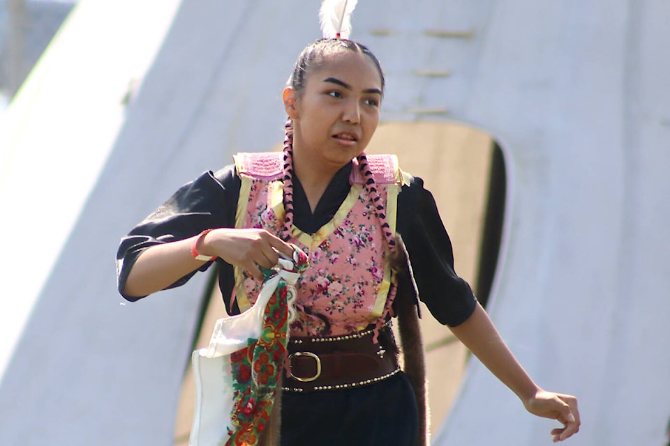 A women’s fancy dancing competitor gracefully moves across the powwow arena at the second annual Tipi Village on Thursday, June 28. (File photo)