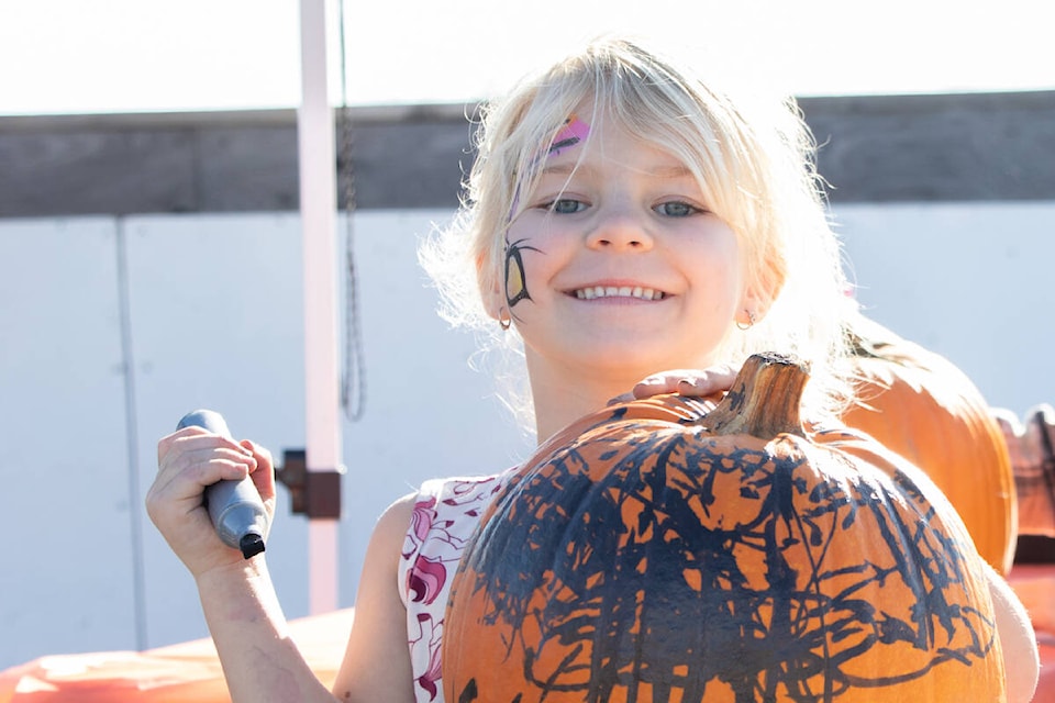 Sophiarobin Muir doing a pumpkin craft. Photo by Sarah Caissie.