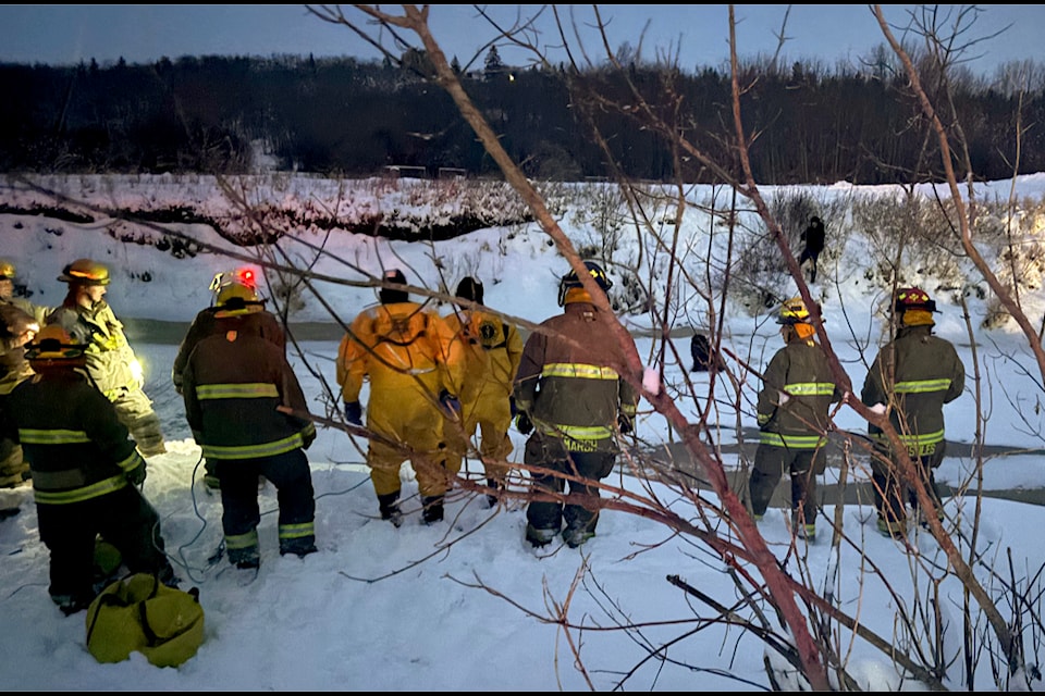 The Ponoka County Regional Fire Services East District department rescues a dog caught on the thin ice on the Battle River on March 28.