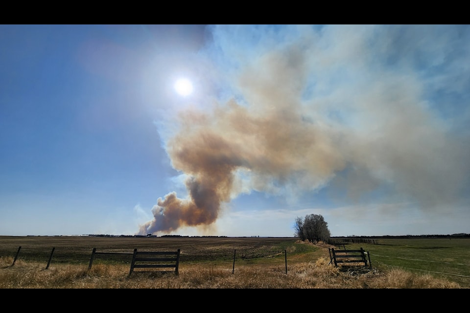 Smoke seen from Highway 822 near 611 southeast of Wetaskiwin on Friday, April 25. 