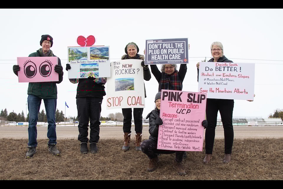 Members of the Maskwacis-Wetaskiwin NDP Constituency Association were joined by other groups to protest a UCP event in Wetaskiwin on March 20.