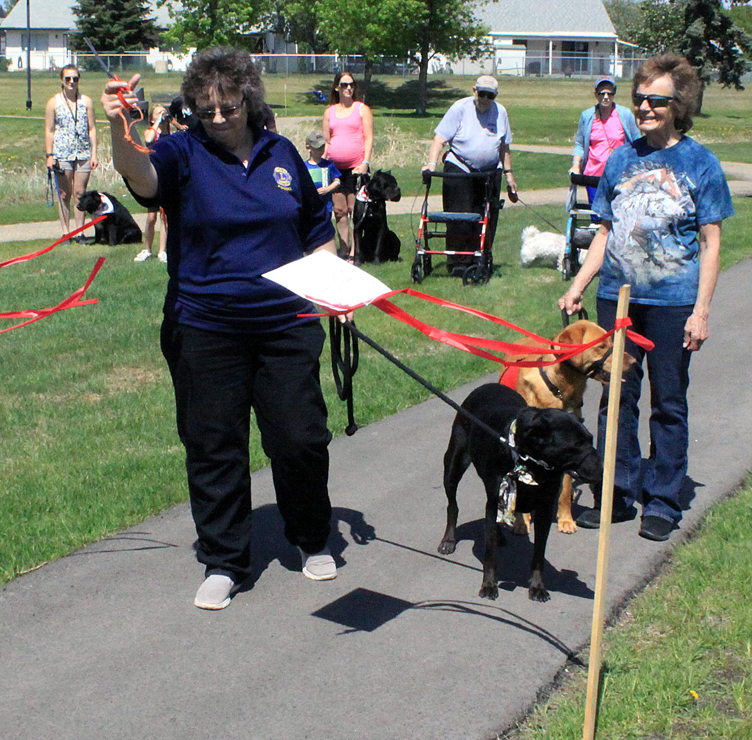 12066367_web1_180530-PON-GuideDogWalk_2