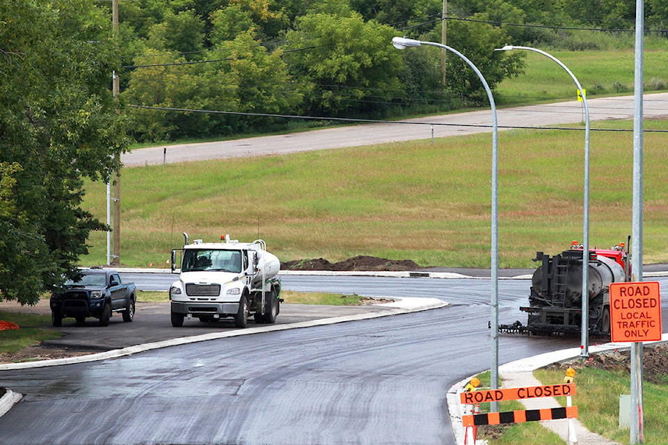 13218757_web1_180829-PON-road-paving_1