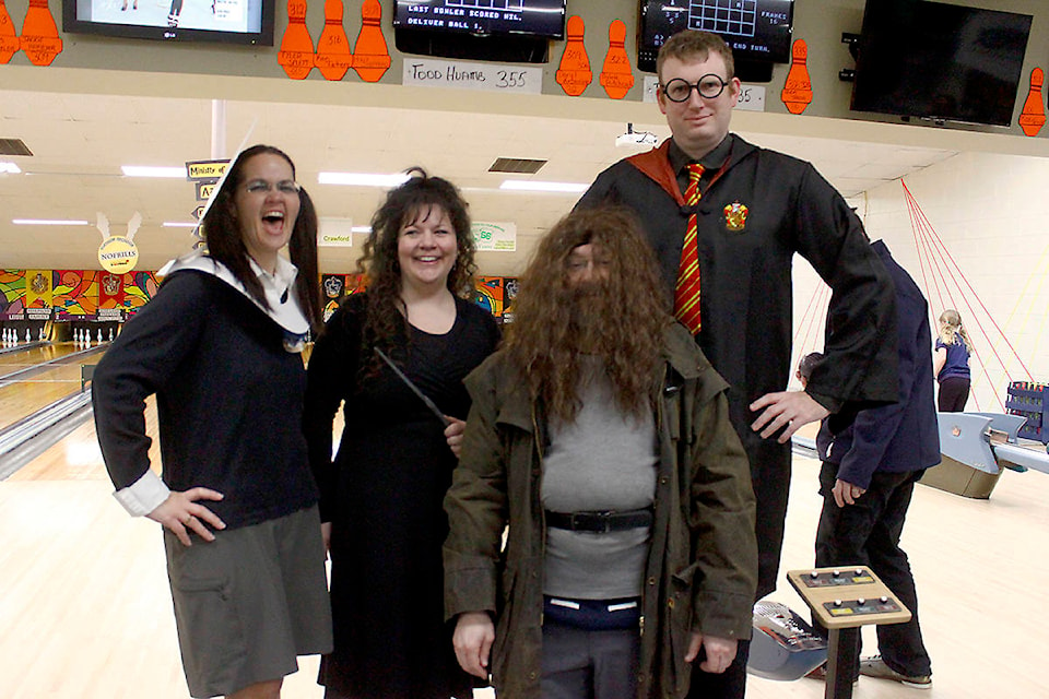 Team Crawford Agencies was dressed as popular Harry Potter characters: Moaning Myrtle, complete with toilet seat, Belatrix Lestrange, Harid and Harry Potter himself. L-R: Crystal Waldren, Jessica Nelson, Ryan Crawford and Adam Bullock. Photo by Emily Jaycox