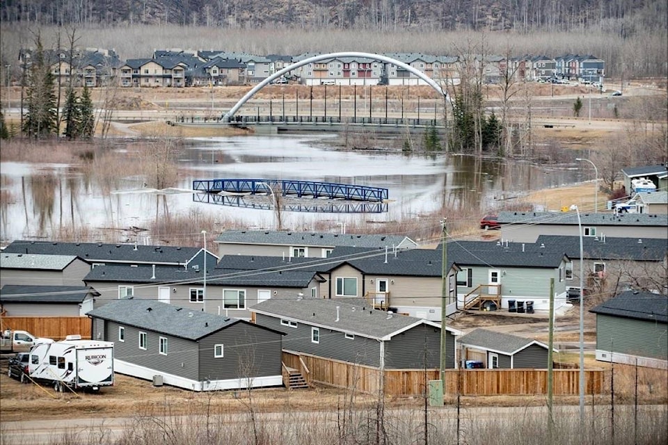 21407171_web1_200429-RDA-How-much-can-a-person-take-Flooding-forces-13000-from-downtown-Fort-McMurray-flooding_1