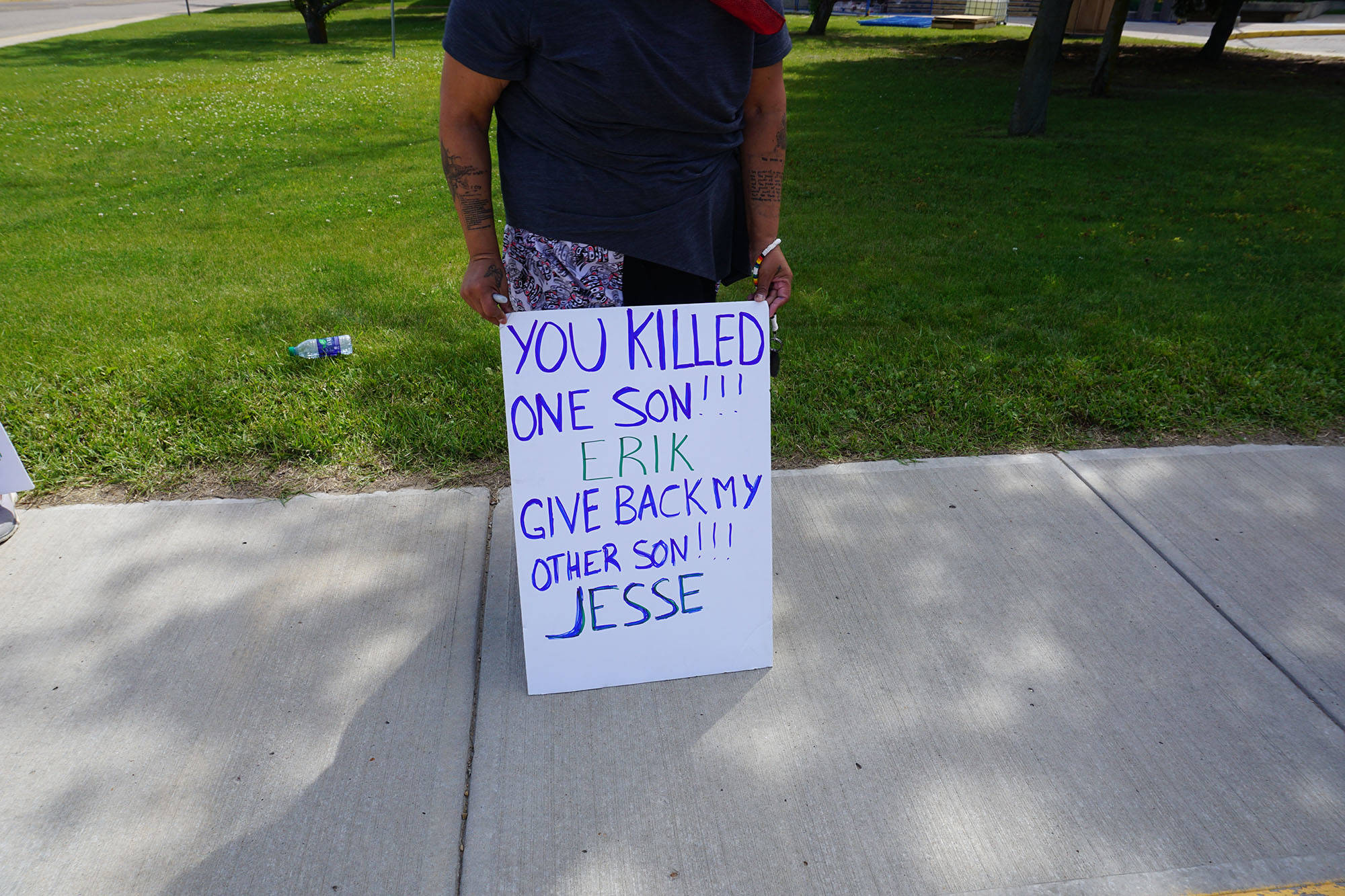 Protesters outside the Wetaskiwin Courthouse demanded change after the