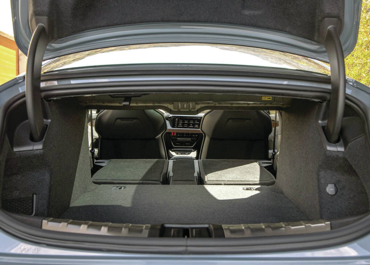 Although the E-tron GT is a sedan, its certainly not the roomiest. The trunk is small but acceptable and the seatback folds forward for transporting longer items. PHOTO: AUDI