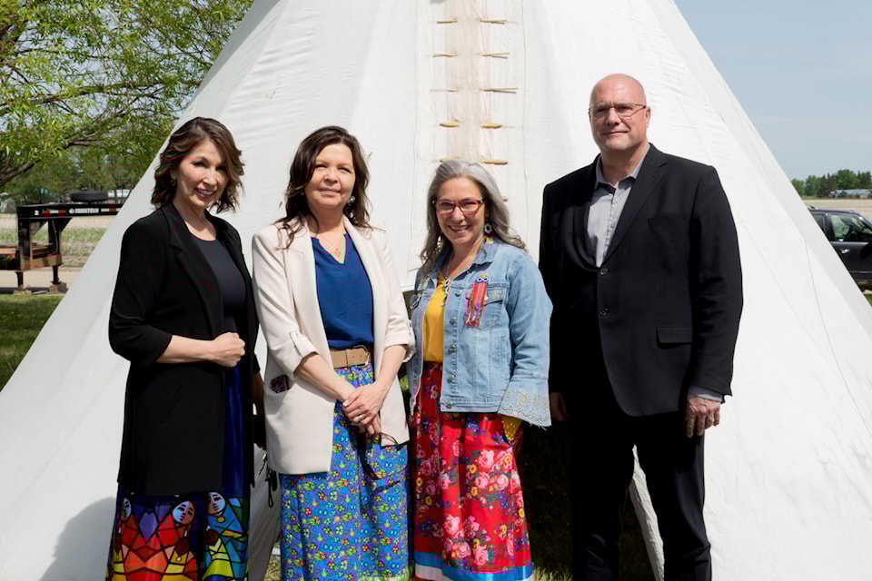 Left To Right: Dr. Shauna Bruno, board chair Maskwacis Education School Commission; Tracy Swampy-Sylvester, superintendent Maskwacis Education School Commission; Luci Henry, board chair Wolf Creek Public Schools; and Tim De Ruyck, Wolf Creek Public Schools superintendent, gathered as part of a signing ceremony with community members, elders, and leadership from each school division for renewed educational partnership. (Photo submitted)