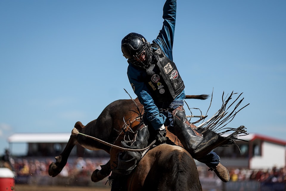 Ponoka Alberta's Garrett Green rides LB’s Santana for 85.5 and advances to the Ponoka Stampede Finals on Canada Day. 