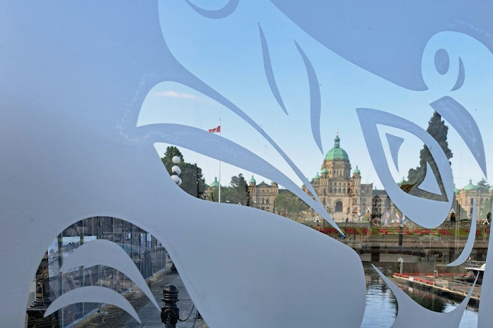 The Parliament building can be seen through the new Inner Harbour marina gates.