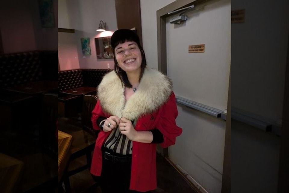 Kat Sebelius, The Churchill’s bar manager, was all smiles after the fox fur was returned.