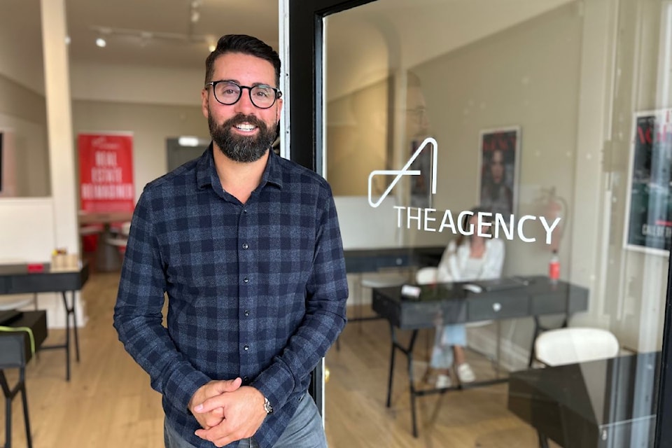 Jason Binab, managing partner at The Agency, stands at its new location on Oak Bay Avenue, which officially opened in September.
