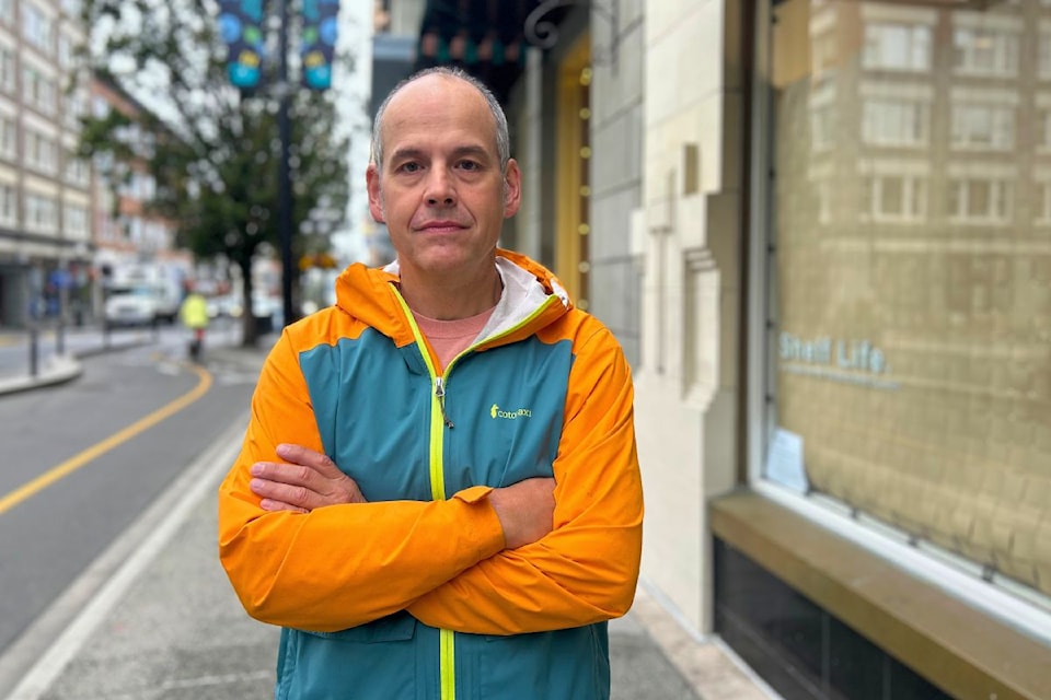 Ronnie Montreal stands in front of his piece Ta’pitj’ij (Little David) at 670 Fort St.