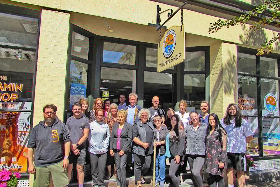 Staff at Vitamin Shop on Broad Street in June, 2024. The business is 40 this year.