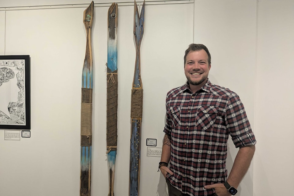 Guillaume Schoon stands with one of his pieces.