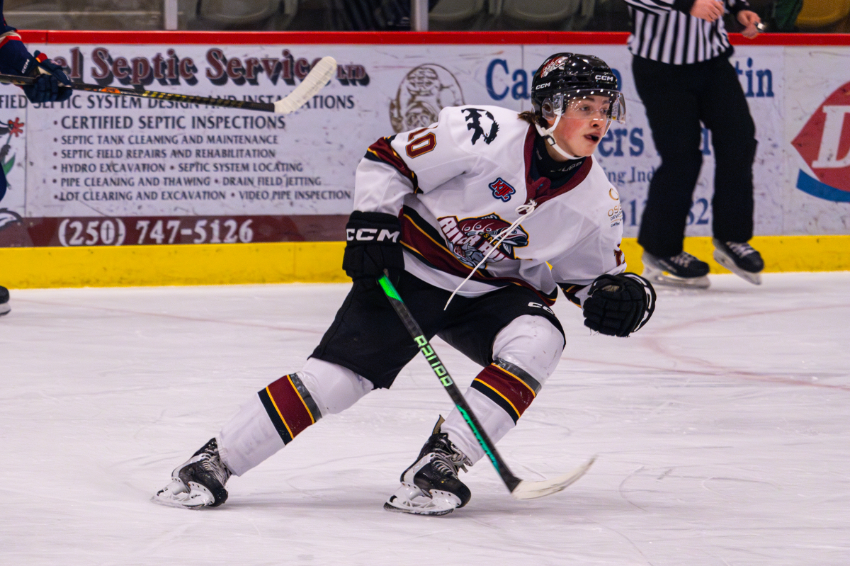 Jayden Mackie skates across the ice in one of the Rush games through the season