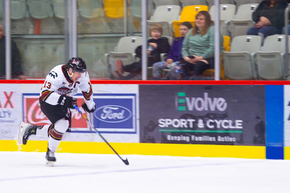 Captain Bennett Kuhnlein rapidly goes across the ice.