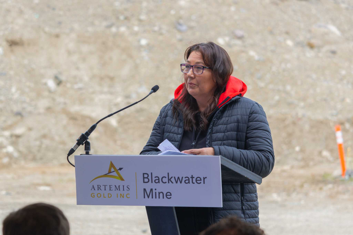 Acting Chief June Baptiste of the Lhoosk'uz Dene Nation speaks to those present at the mine's opening.