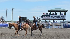 86079quesnelRidingintheManitobaStampedegrandstand2