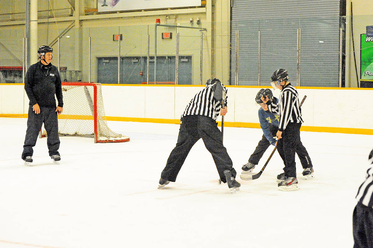 8742488_web1_170929-WLT-hockeyrefs_3