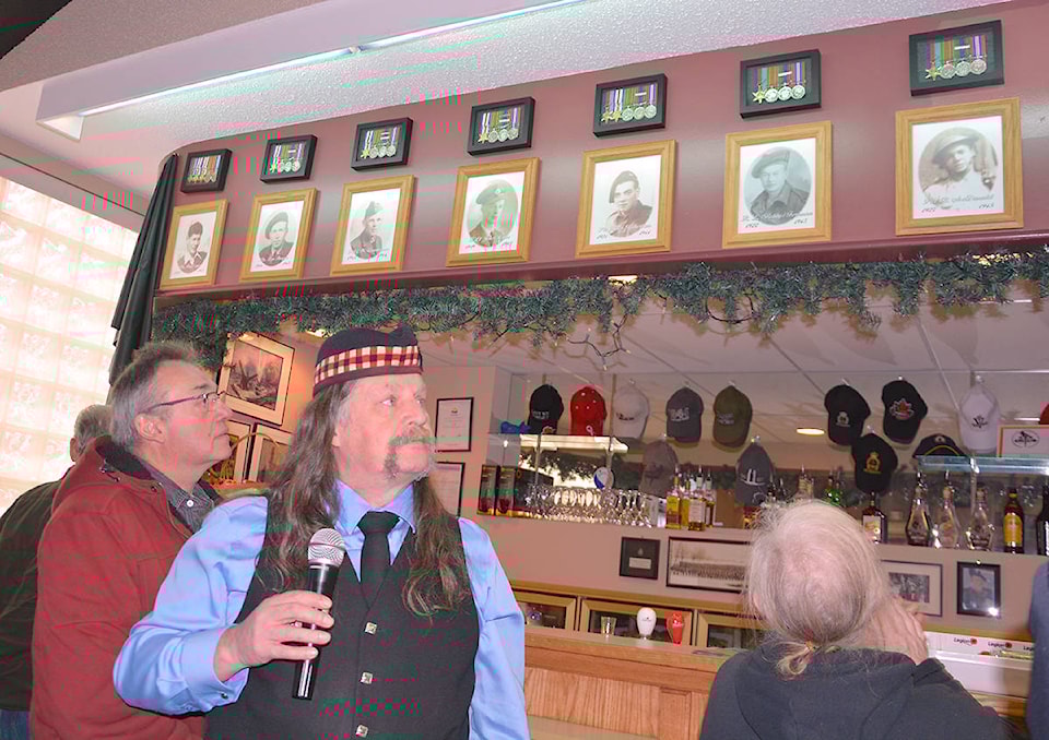 9689681_web1_Doug-Carey-with-medals2