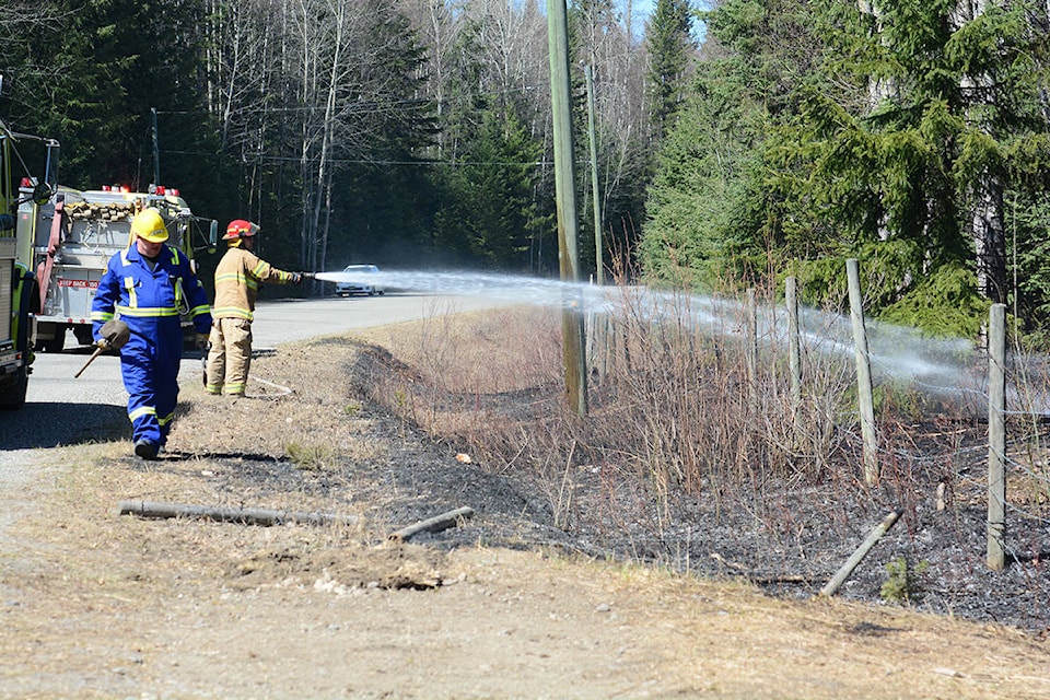 11637371_web1_180502-QCO-Paradise-road-fire_2