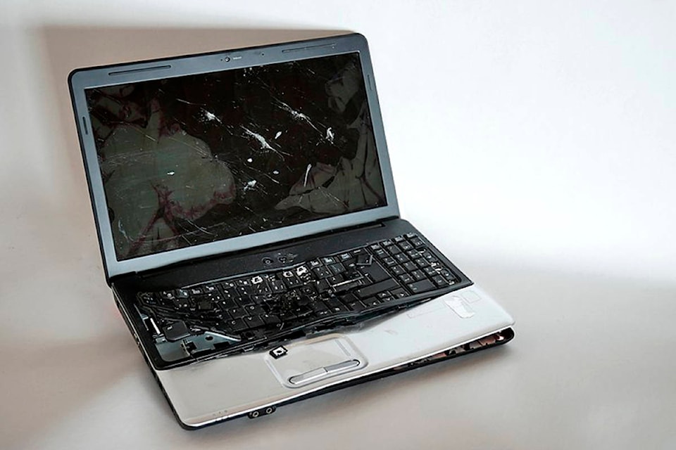 12608070_web1_180706-QCO-Broken-laptop