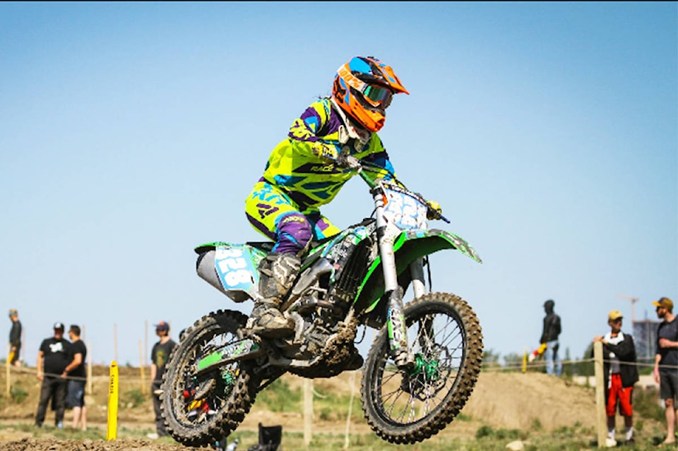 12743627_web1_180718-QCO-motocrossgirl