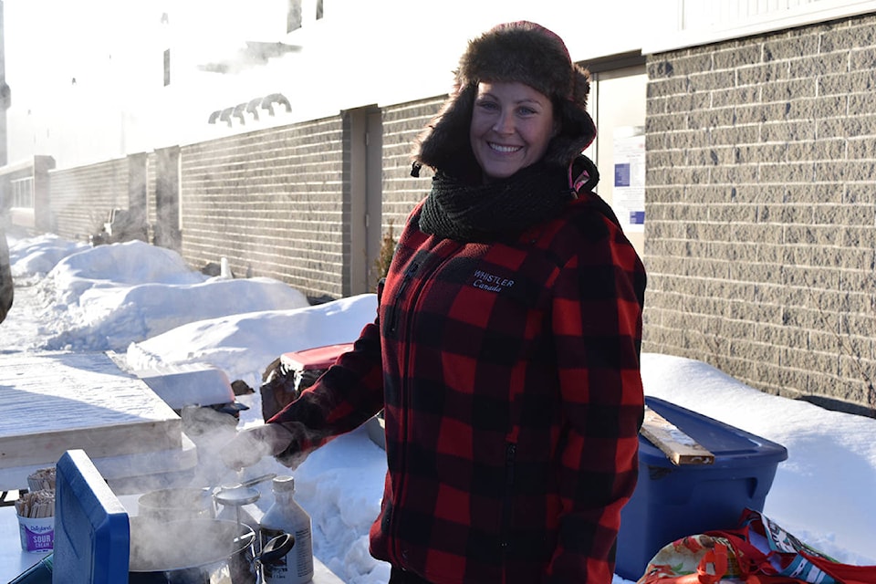 Marie-Soleil Forsyth boils maple syrup to make maple syrup snow candy. Heather Norman photos