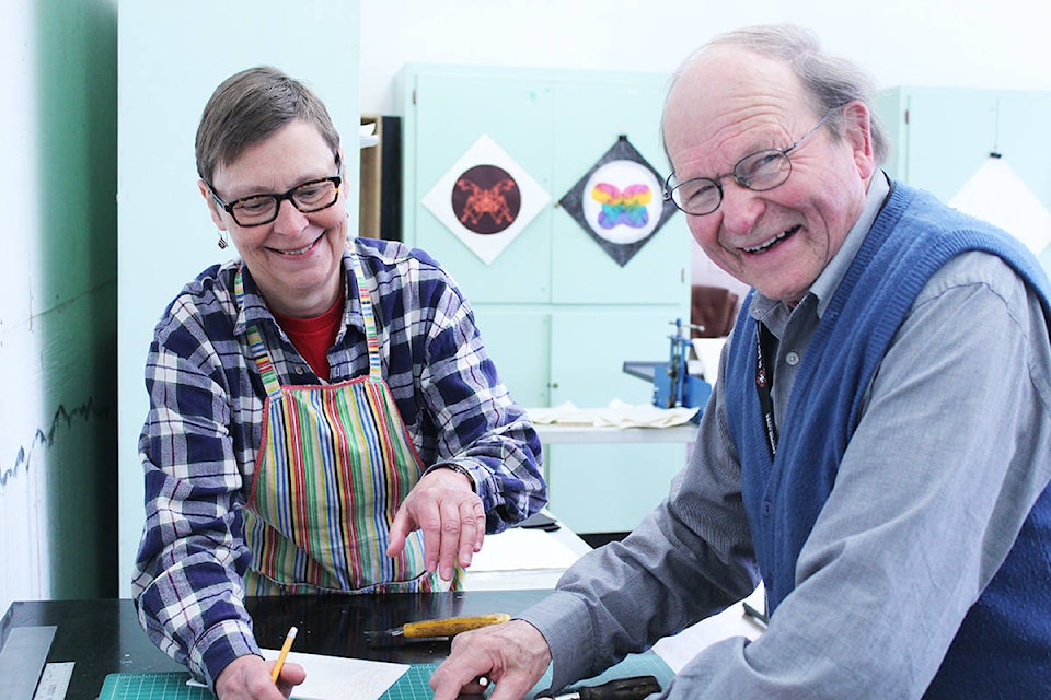Wellsian Anne Laing learns printmaking from Hans-Christian Behm Monday, March 25 at Island Mountain Arts’s Winter Printmaking Residency in Wells. Learn more about the residency on Page 7. Photo by Julie Fowler/Island Mountain Arts