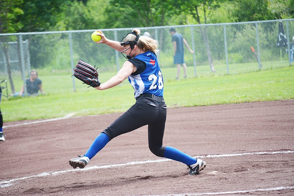Quesnel’s Taylor Parr pitches in Sunday evening’s Silver Division final against Abbotsford. Lindsay Chung photo